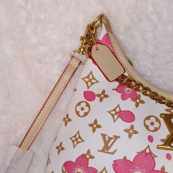Louis Vuitton Elegant Cherry Blossom Crossbody Bag with Gold Accents - Picture 7 of 10